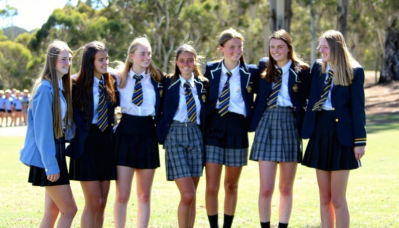 Australian high school students aged 1718 in uniform they are with a group of friends in their lunch break-1